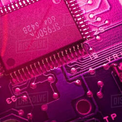 image of an image of circuitry with a pink overlay